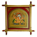 Patachitra Tribal painting of Lord Ganesh on Palm leaves, framed with can sticks