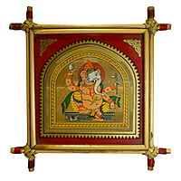 Patachitra Tribal painting of Lord Ganesh on Palm leaves, framed with can sticks