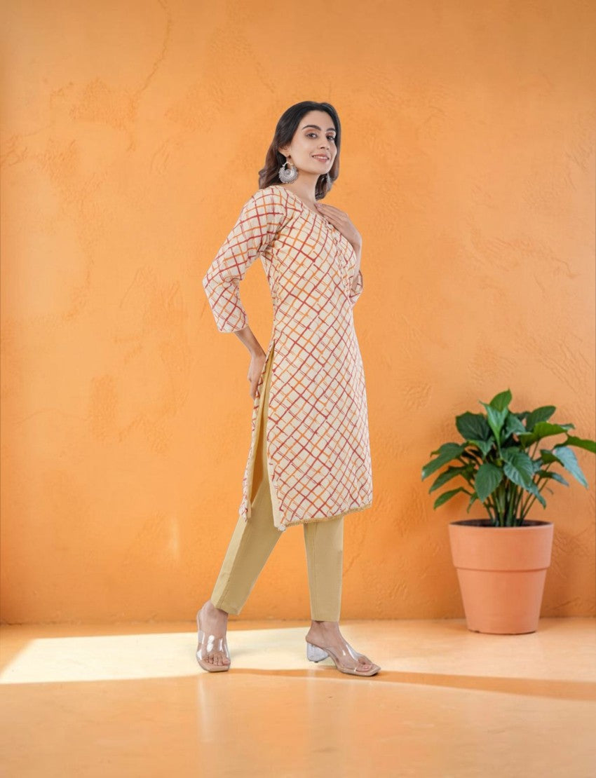 Eelika beige and orange checkered organza salwar suit set with 3/4th sleeves and cotton trousers