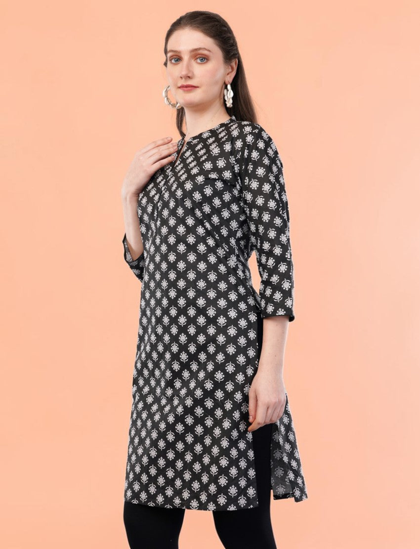 Eelika black and white floral print cotton kurti with mandarin collar and 3/4 sleeves worn by a model
