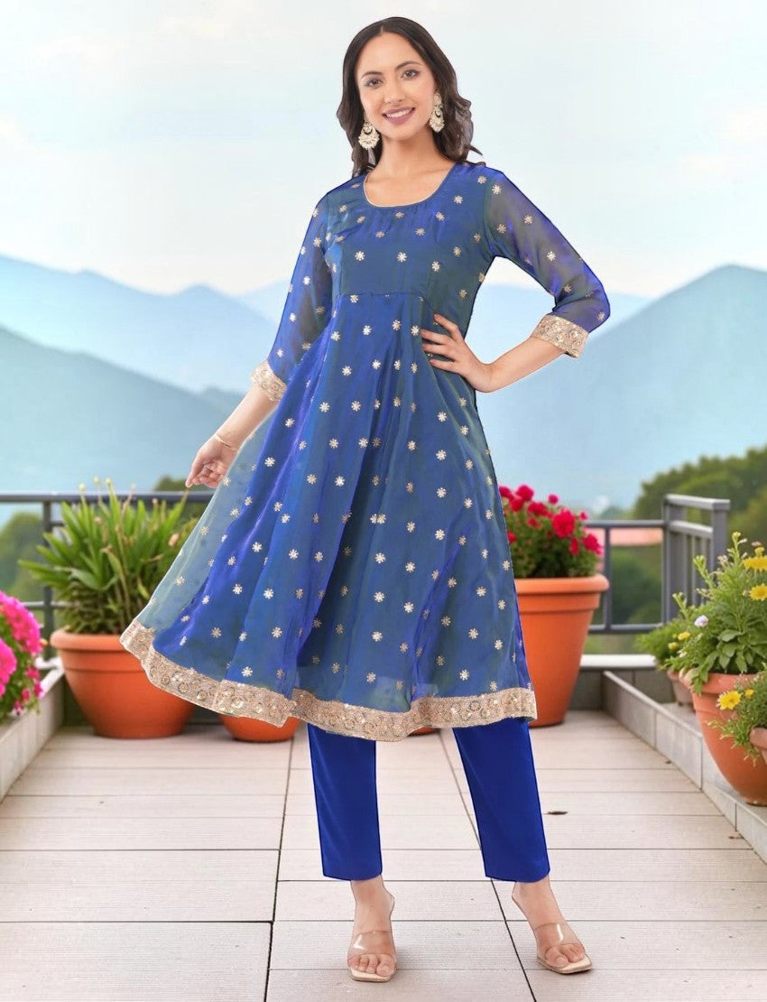 Eelika blue chiffon Anarkali kurta set with floral embroidery, 3/4 sleeves, and matching cotton trousers.