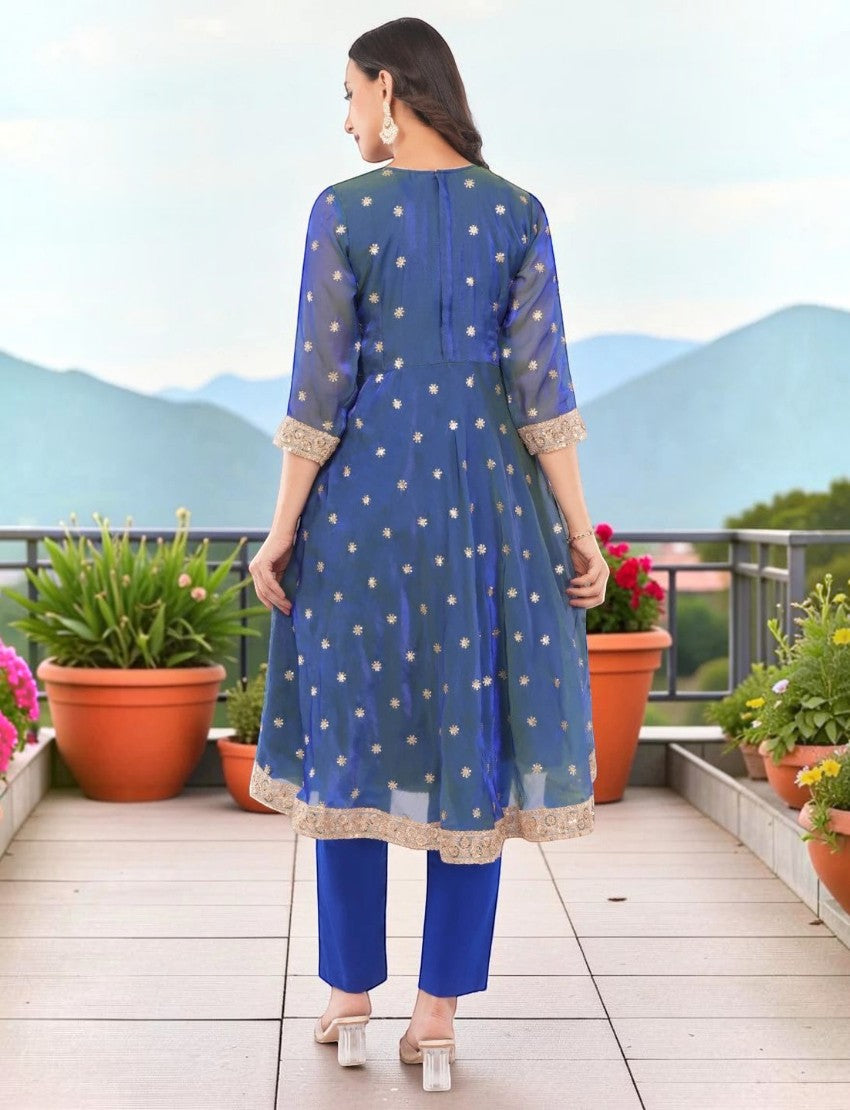 Eelika blue chiffon anarkali kurta set with floral embroidery, 3/4 sleeves, and matching trousers, back view.