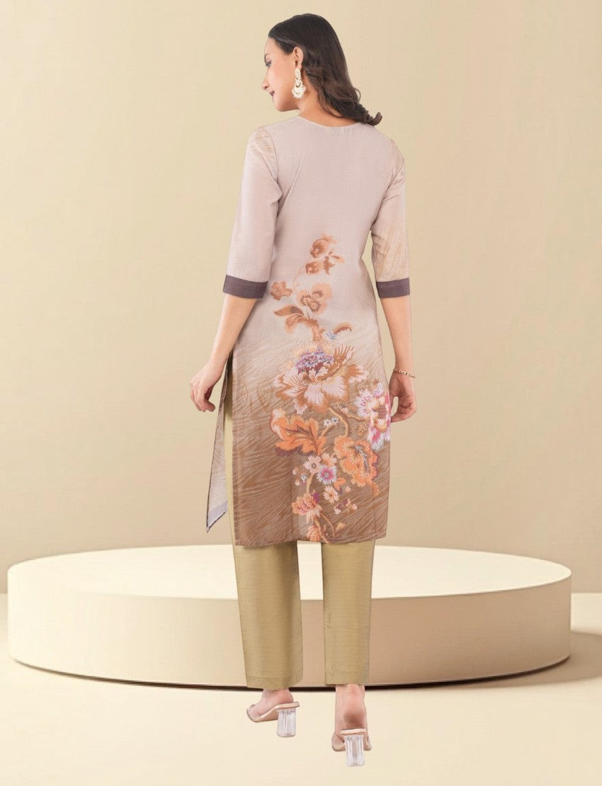 Eelika brown cotton salwar suit set with floral print, calf-length kurta, and trousers, viewed from the back.