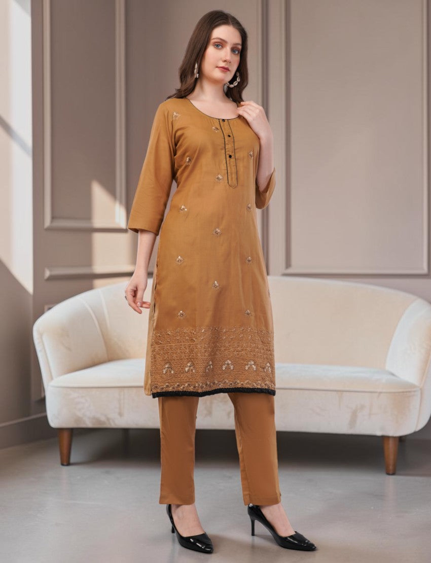 Eelika caramel brown cotton salwar suit set with embroidered knee-length kurta, 3/4 sleeves, and black border trim