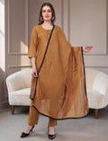 Eelika caramel brown cotton salwar suit set with 3/4 sleeves, black border trim, and matching dupatta