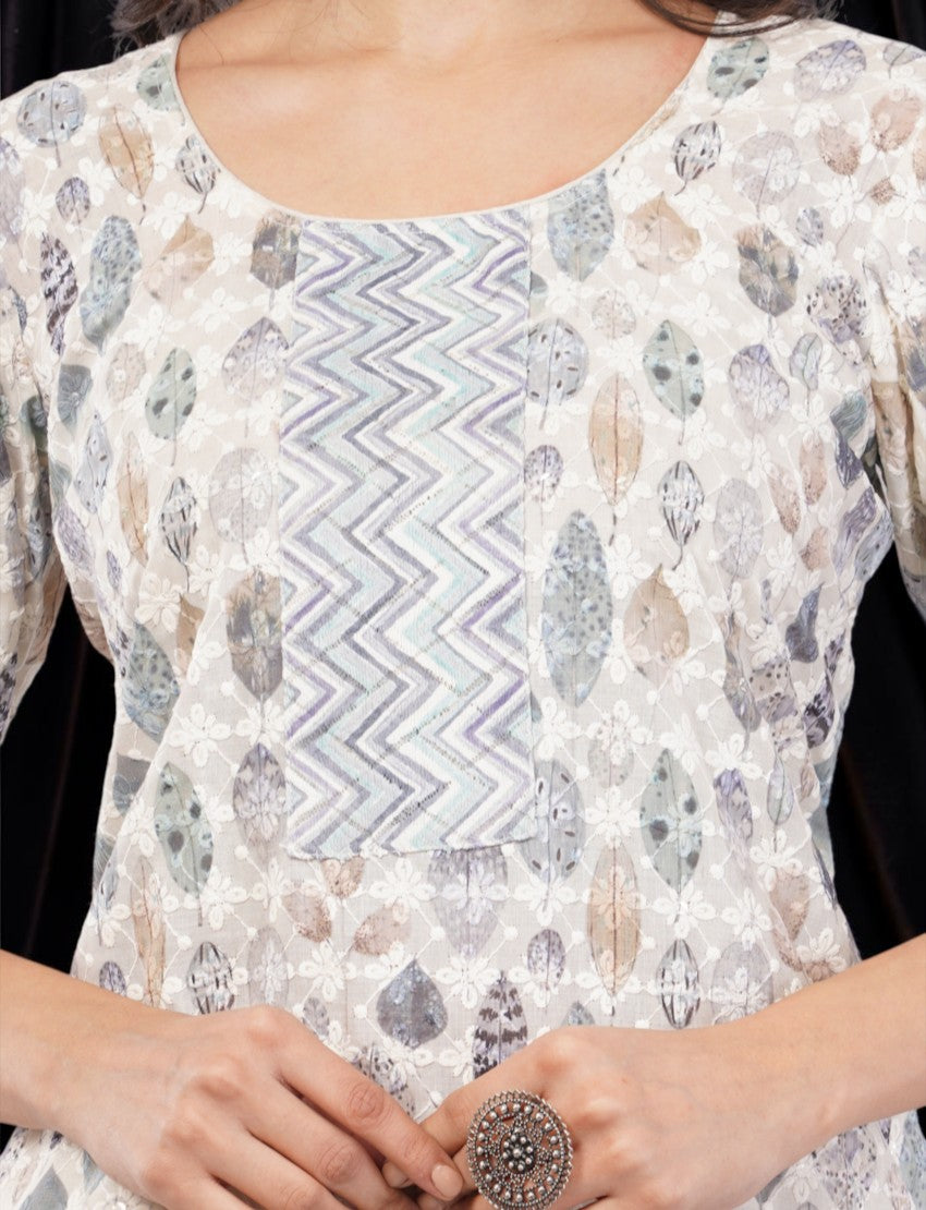 Eelika cotton salwar suit featuring a leaf print, round neck with chevron embroidery, and 3/4th sleeves