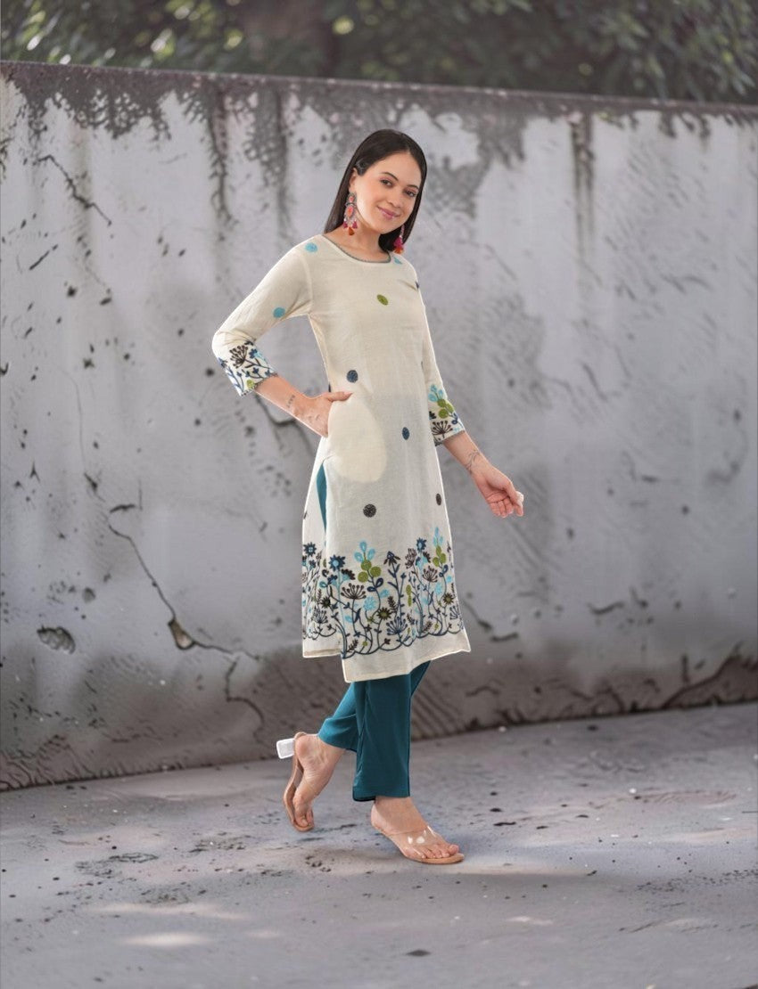 Eelika cotton salwar suit set with printed calf-length kurta, 3/4 sleeves, and teal trousers with pockets