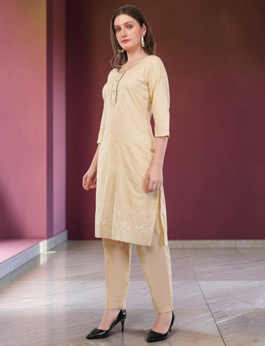 Eelika cream cotton salwar suit set with embroidered knee-length kurta, 3/4 sleeves, and matching trousers