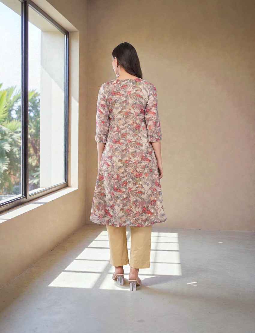 Back view of a woman wearing an Eelika floral printed cotton Anarkali kurta with beige trousers and 3/4th sleeves