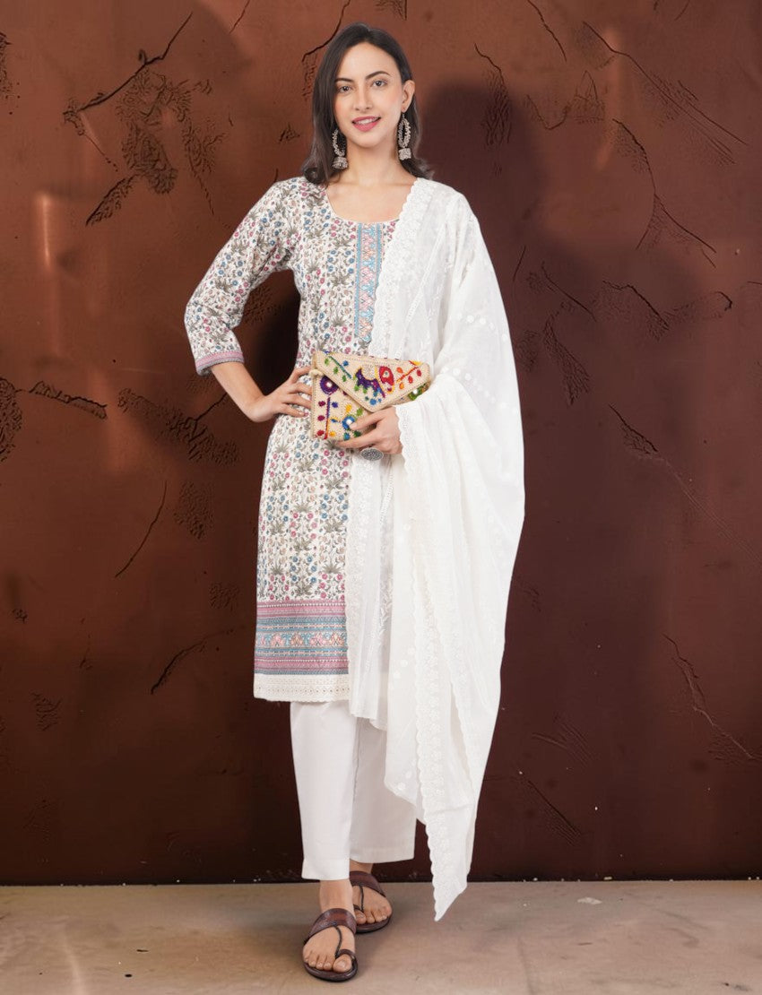 Eelika floral print cotton salwar suit with 3/4 sleeves, white trousers, and a matching white embroidered dupatta.
