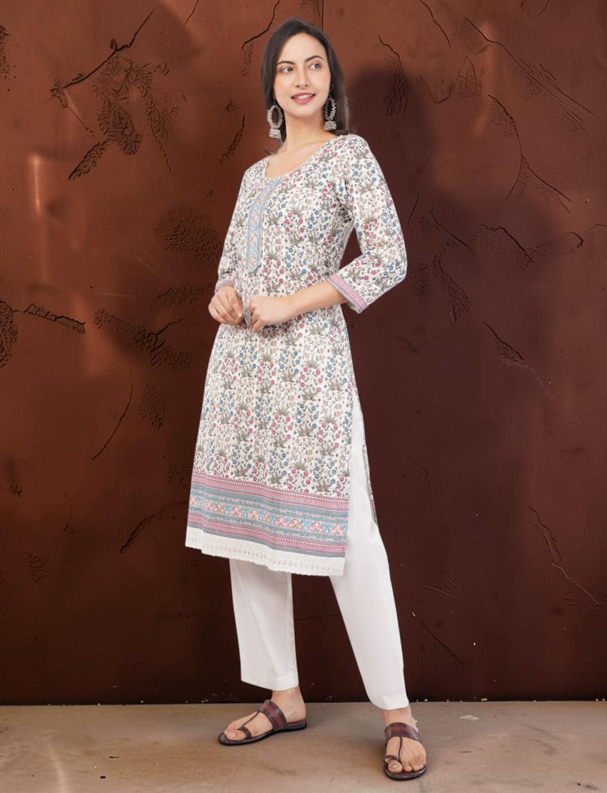 Eelika floral print cotton knee-length kurta with 3/4 sleeves, white trousers, and dupatta on a model