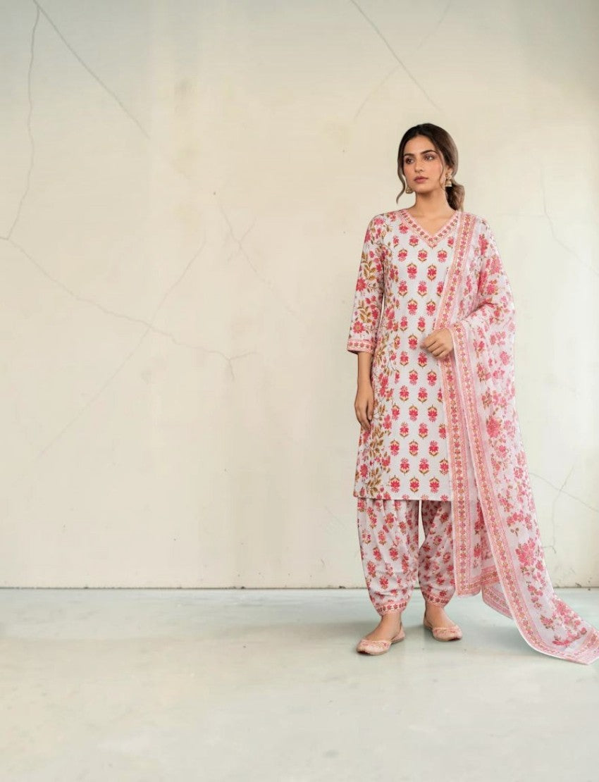 Eelika cotton salwar suit set featuring a white calf-length kurta with pink floral print, V-neck, and matching dupatta