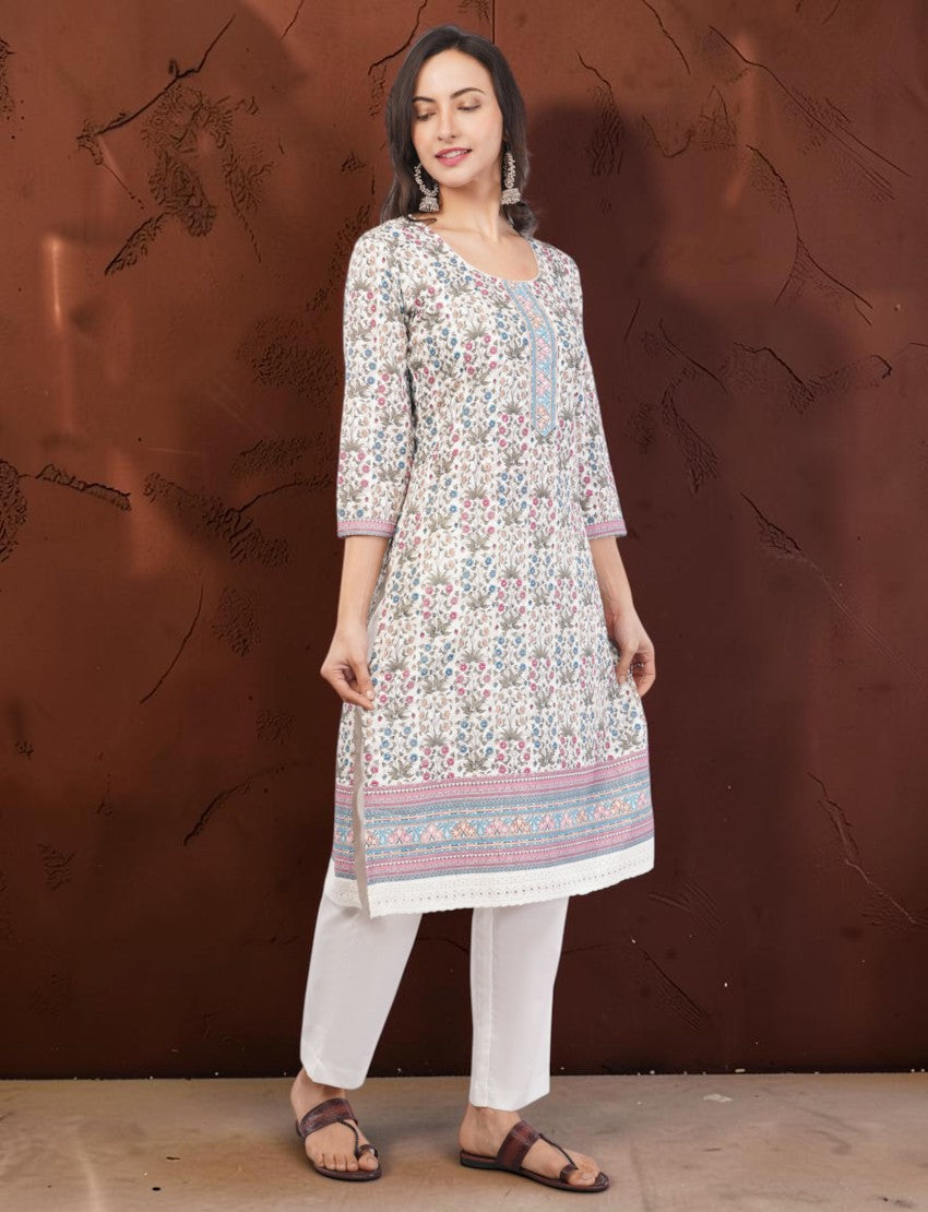 Eelika floral print cotton salwar suit with 3/4 sleeves, round neck, and white trousers on a model