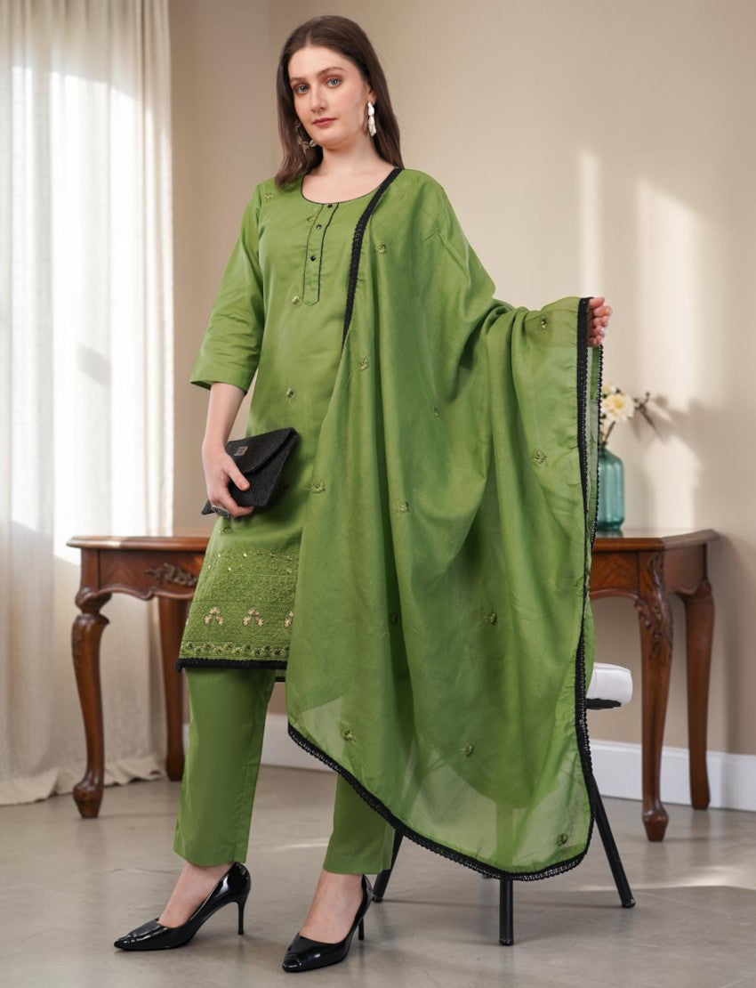 Eelika green cotton salwar suit set with embroidered knee-length top, trousers, and dupatta with black lace trim