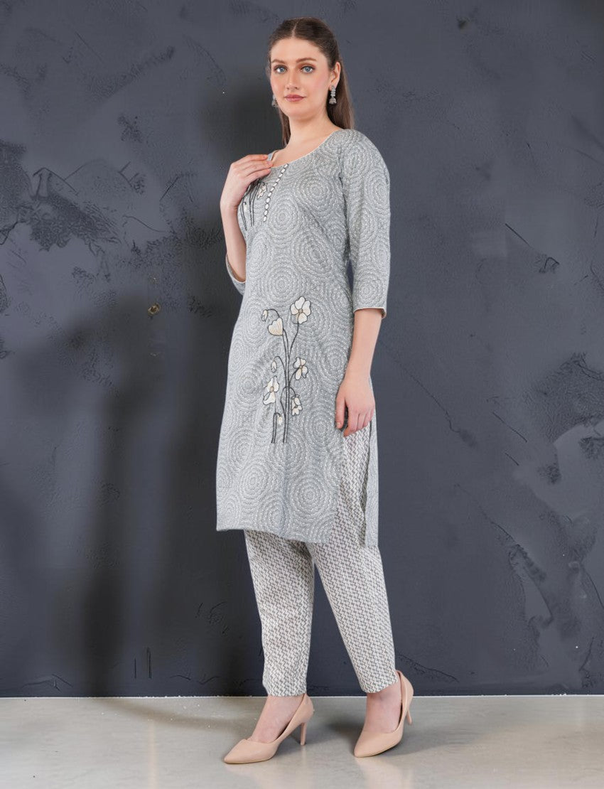 Eelika women's grey cotton salwar suit set featuring a calf-length printed kurta with geometric patterns and trousers
