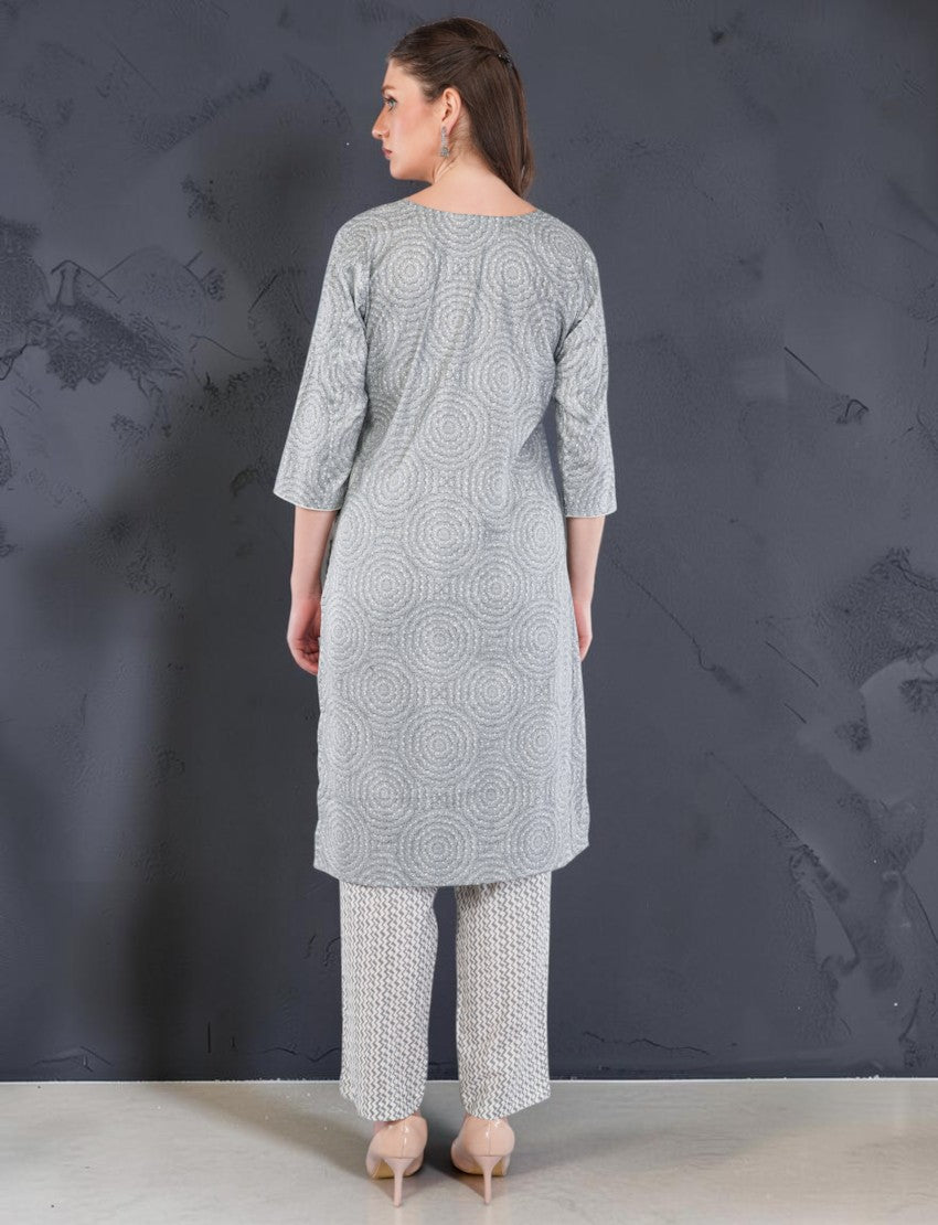 Eelika women's grey cotton salwar suit set featuring a printed calf-length kurta with geometric patterns and trousers