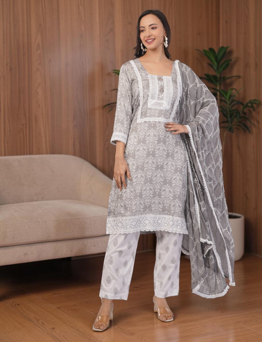 Eelika grey and white cotton salwar suit set with printed knee-length top, square neck, and matching lace trousers.
