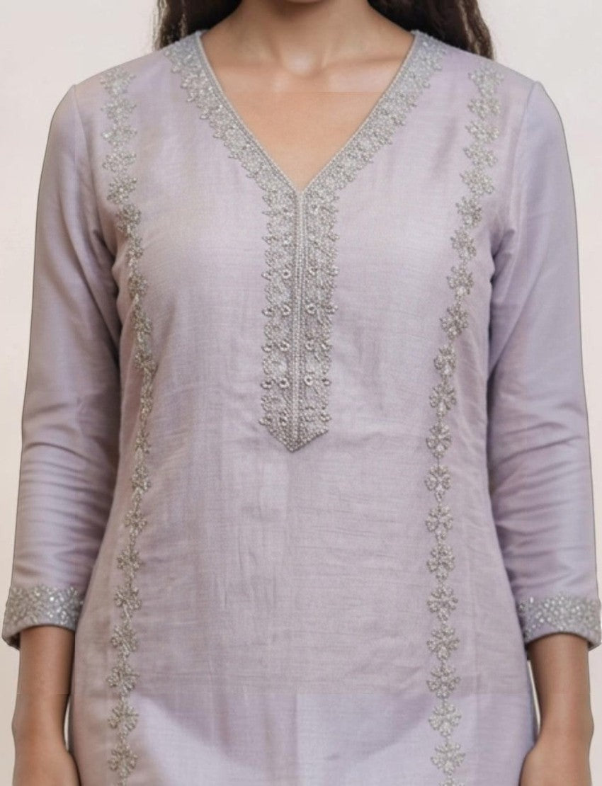Eelika lavender cotton salwar suit with V-neck, 3/4th sleeves, and intricate silver embroidery detailing