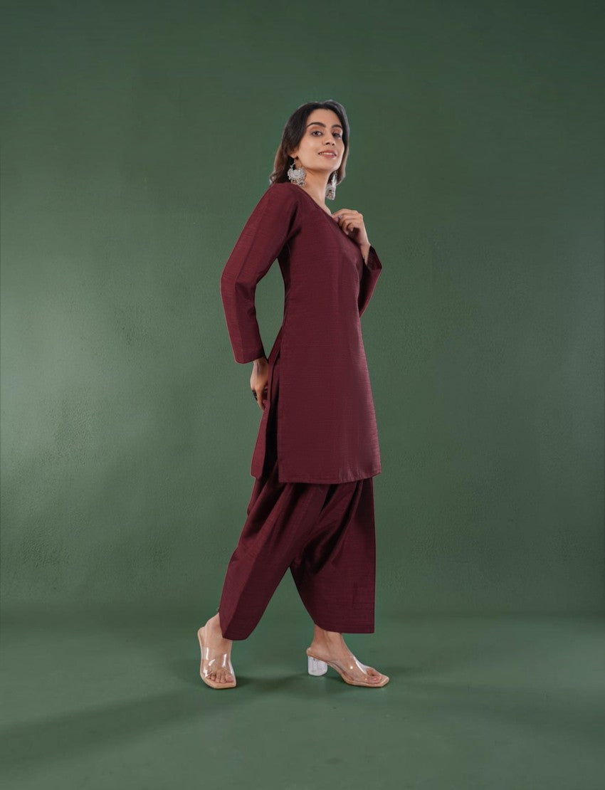 Eelika maroon silk blend Farshi suit set featuring a V-neck kurta with 3/4th sleeves and matching Farshi salwar.