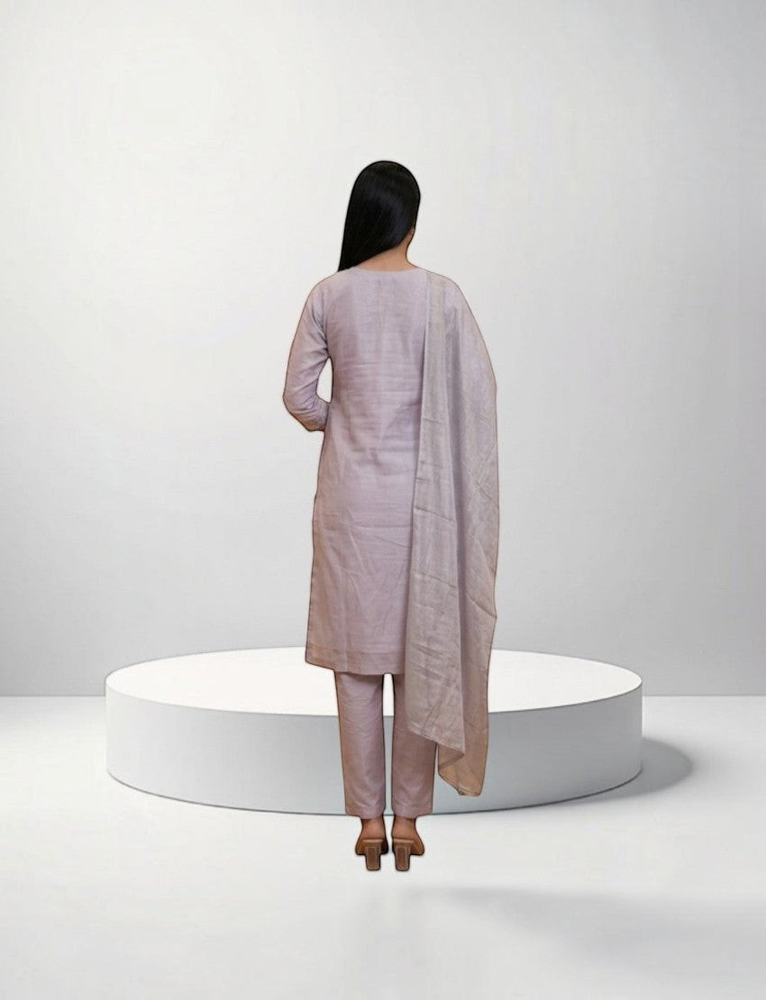 Back view of an Eelika cotton salwar suit set in light mauve with matching trousers and a draped dupatta