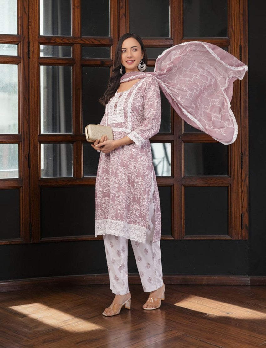 Eelika mauve pink cotton salwar suit set with white lace trim, printed knee-length kurta, and matching trousers