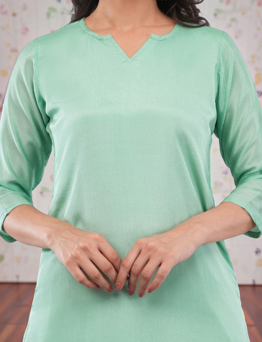 Eelika women's mint green solid silk crepe salwar suit featuring a V-collar and 3/4th sleeves