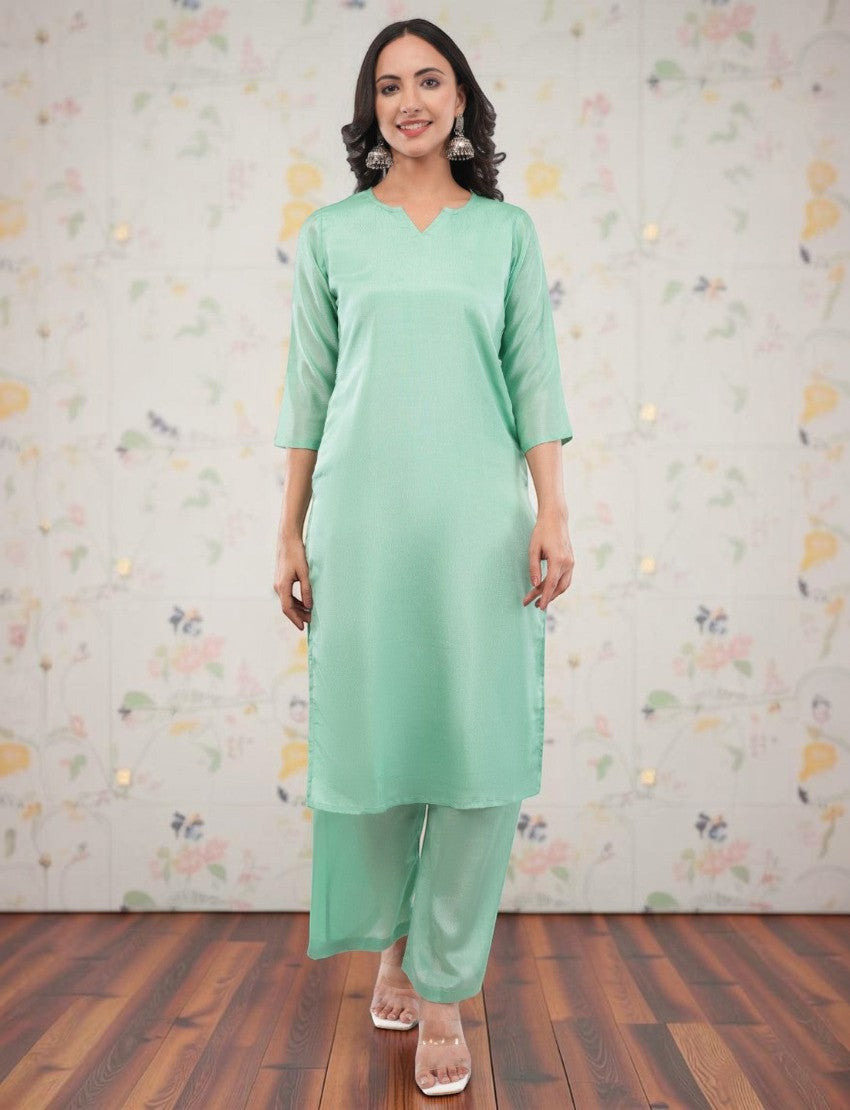 Eelika women's mint green silk crepe salwar suit set with V-neck, 3/4th sleeves, and matching trousers