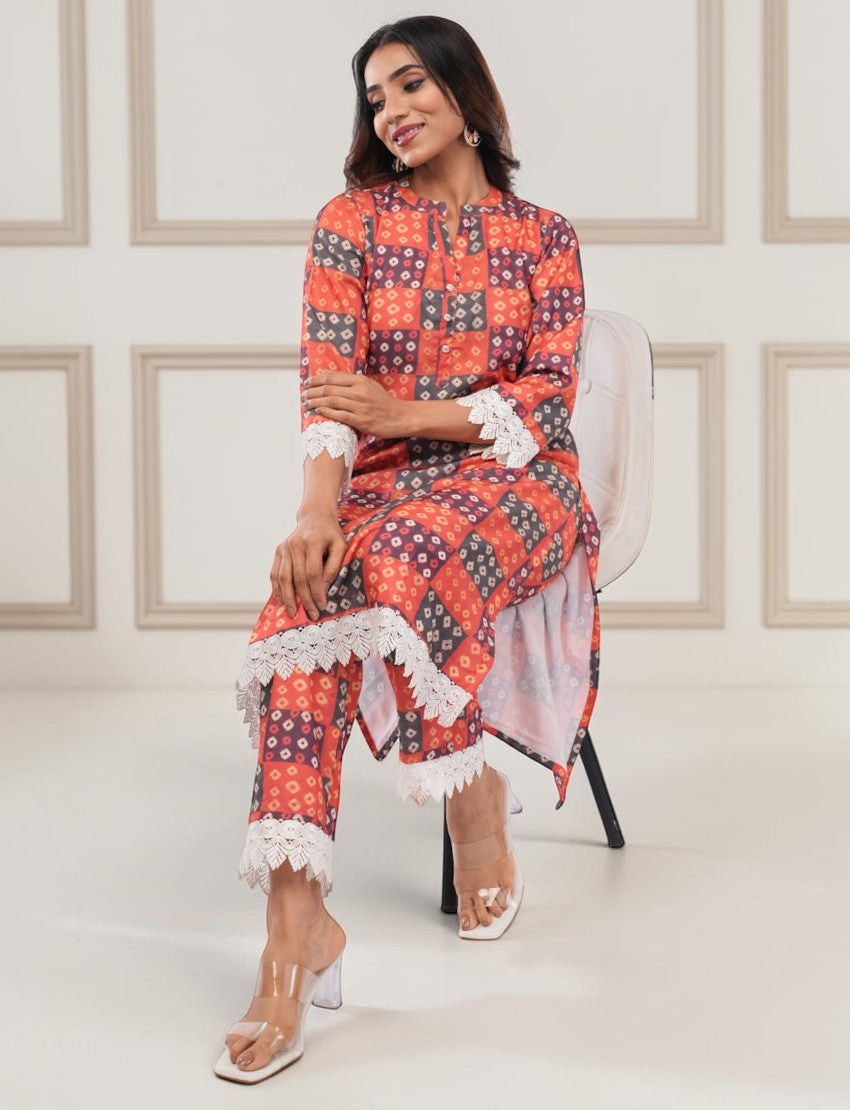 Eelika women's multicolor checkered cotton salwar suit with 3/4 sleeves and white lace trim detail on calf-length top