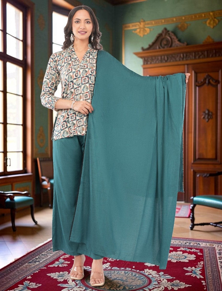 Eelika women's multicolor geometric printed crepe kurta with teal trousers and matching dupatta in a classic room
