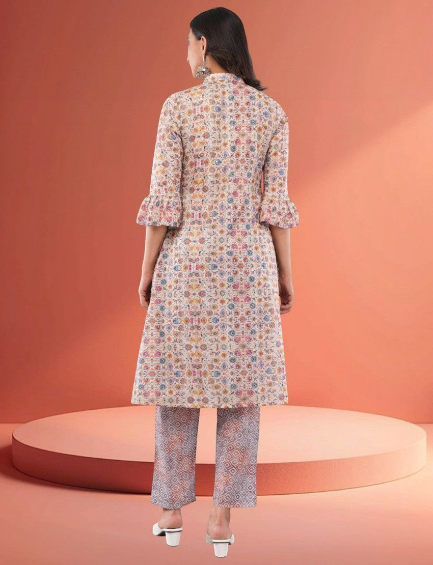 Back view of an Eelika multicolor cotton blend calf-length salwar suit with geometric print and ruffled sleeves.