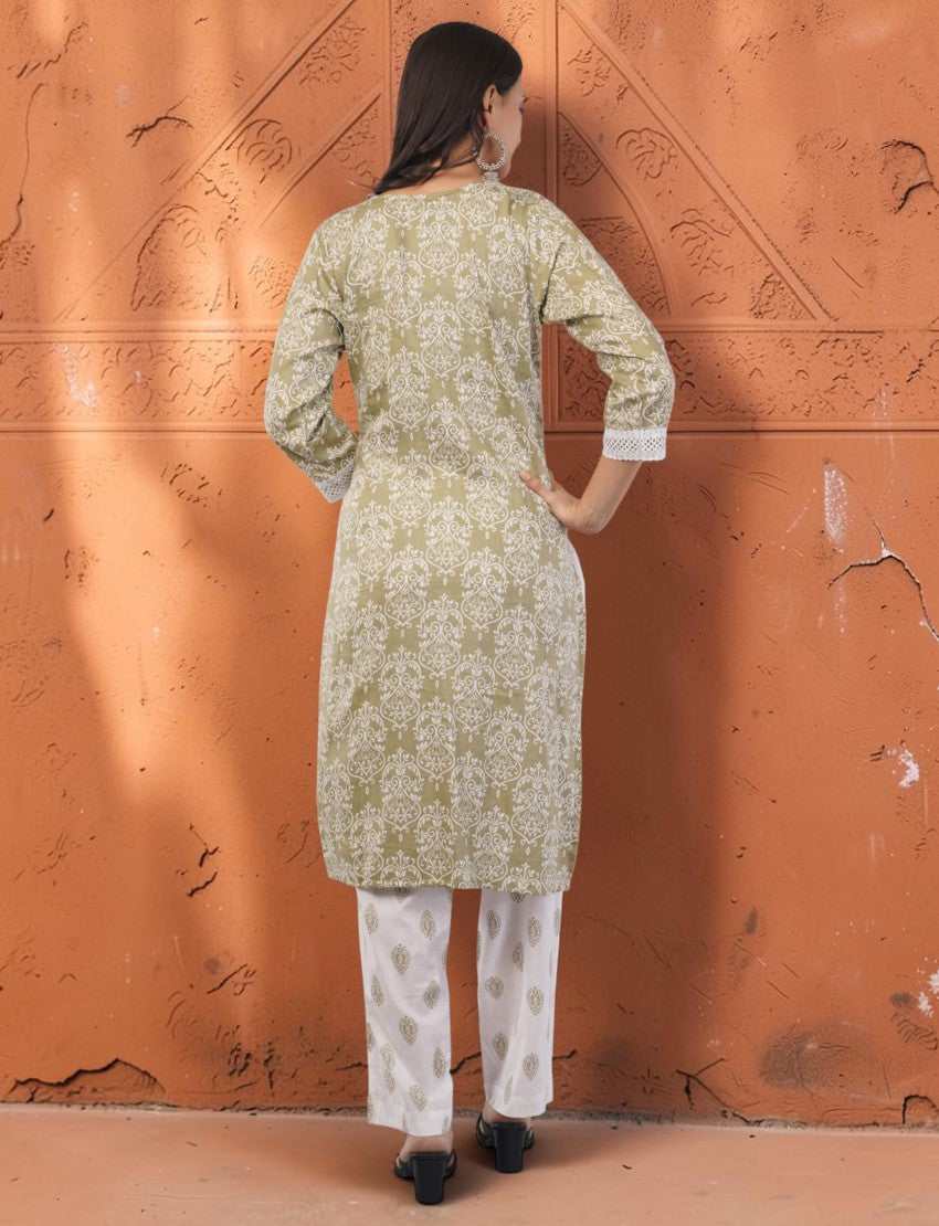 Eelika olive green cotton salwar suit with white floral print, square neck, 3/4 sleeves, and matching trousers