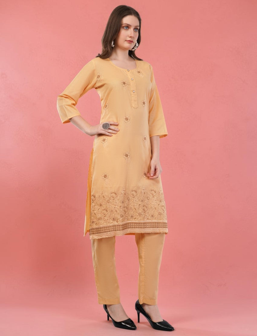 Eelika peach cotton salwar suit set with embroidered knee-length kurta, 3/4 sleeves, and matching trousers