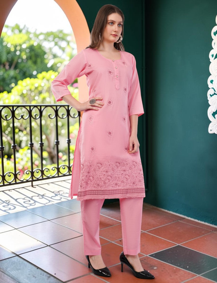 Eelika pink cotton salwar suit set with knee-length embroidered kurta, 3/4 sleeves, and matching trousers