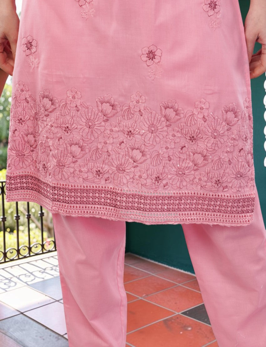 Eelika pink cotton salwar suit set featuring intricate floral embroidery on the knee-length kurta and matching pants