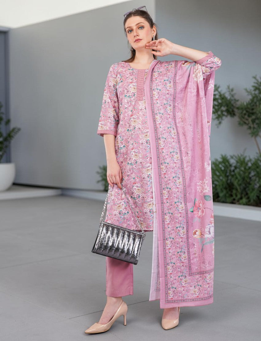 Eelika pink floral print cotton salwar suit set with 3/4th sleeves, matching trousers, and a printed dupatta.