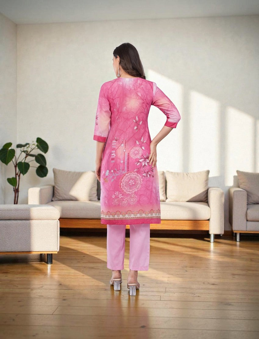 Eelika pink floral print cotton salwar suit set with calf length kurta, 3/4th sleeves, and matching trousers.