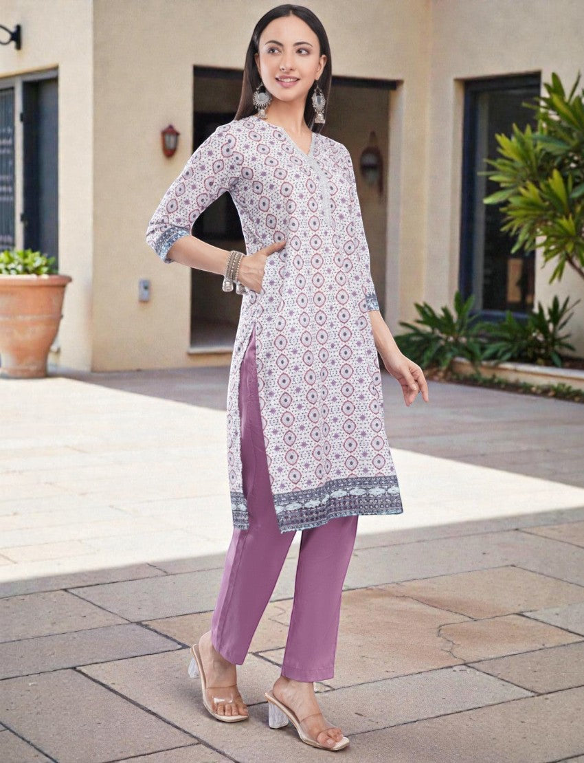 Eelika women's printed cotton calf-length kurta with V-neck, 3/4 sleeves, and matching purple trousers