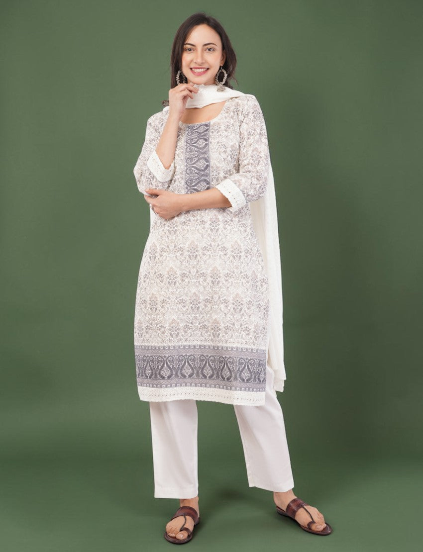 Eelika white and grey cotton printed salwar suit set with 3/4 sleeve knee-length kurta, trousers, and dupatta.