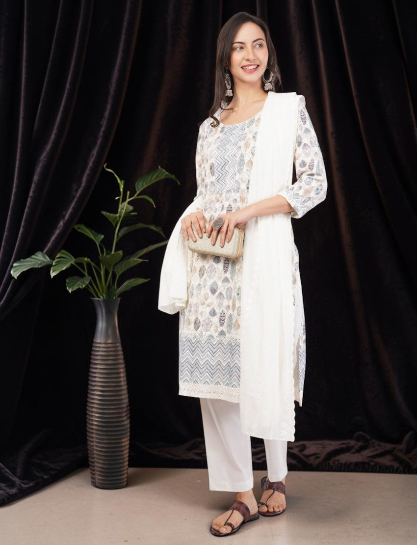 Eelika cotton salwar suit set featuring a printed leaf pattern, round neck, 3/4th sleeves, and a white dupatta.