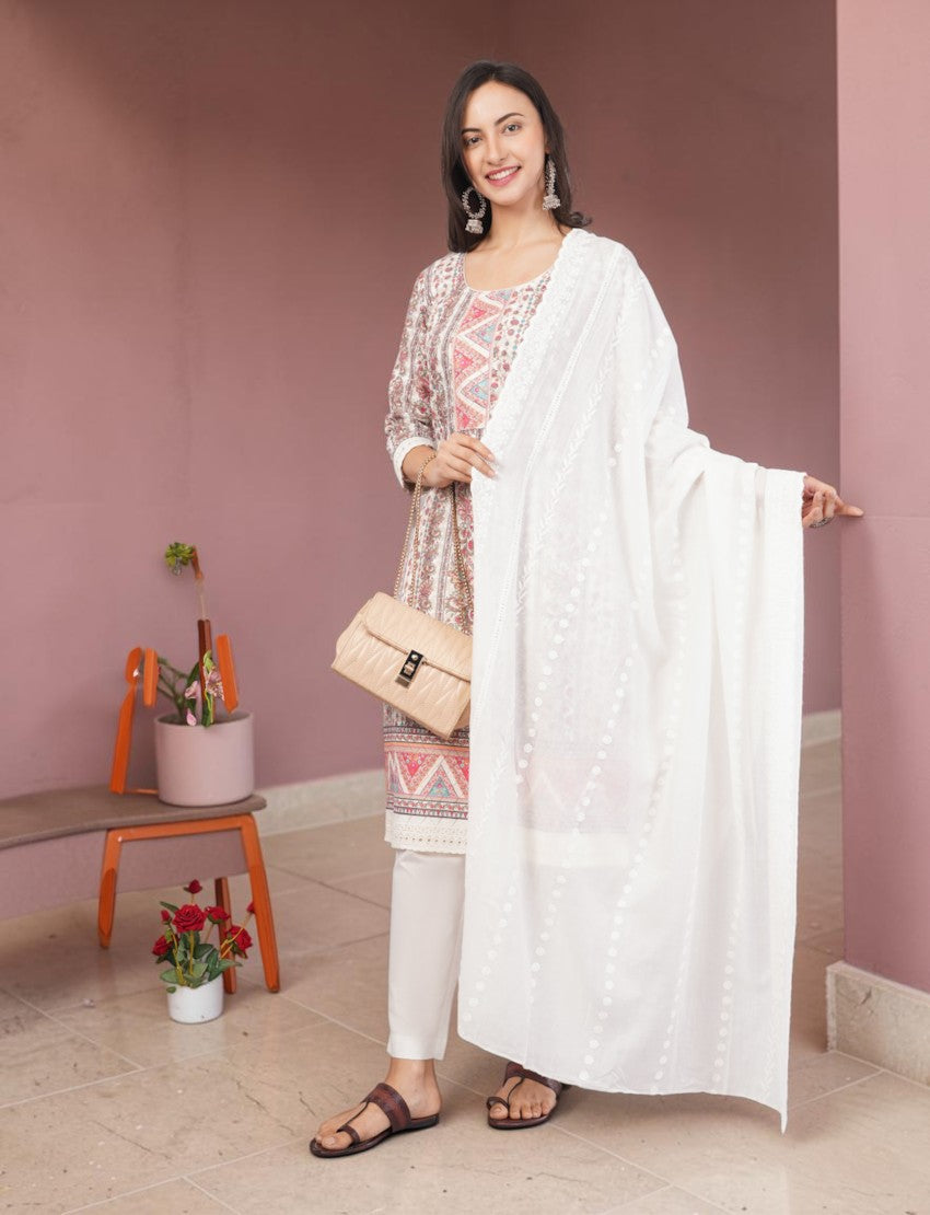 Eelika printed cotton salwar suit with knee-length top, white trousers, and a white dupatta with floral embroidery