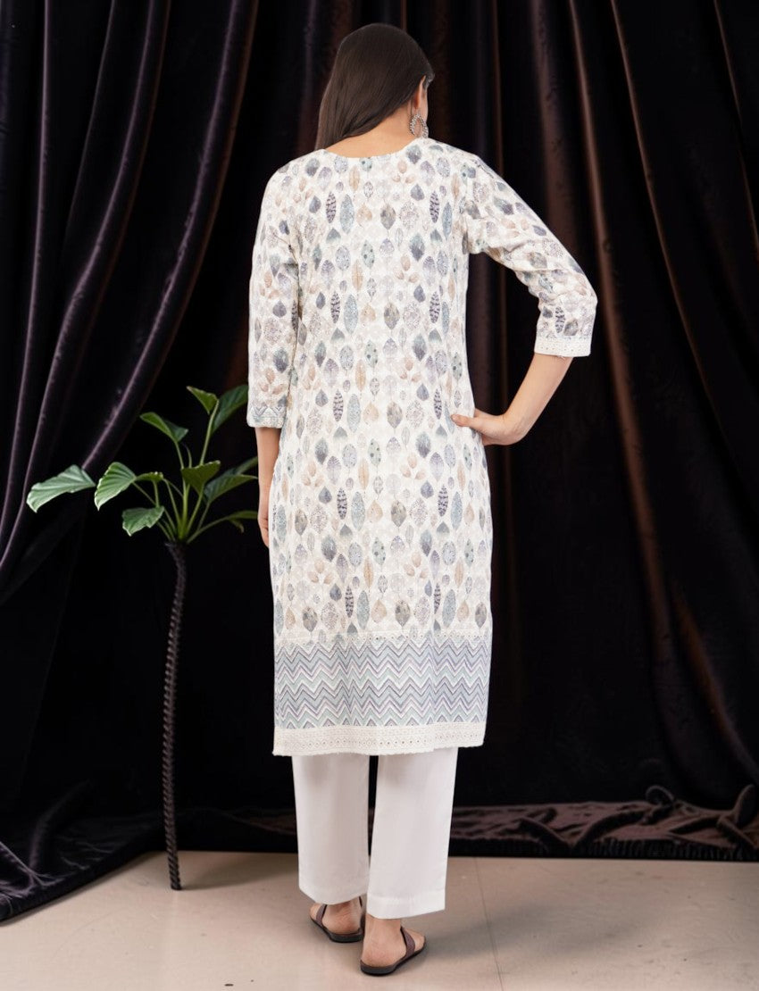 Eelika cotton salwar suit set featuring a printed leaf pattern, knee-length kurta, and white trousers from behind.