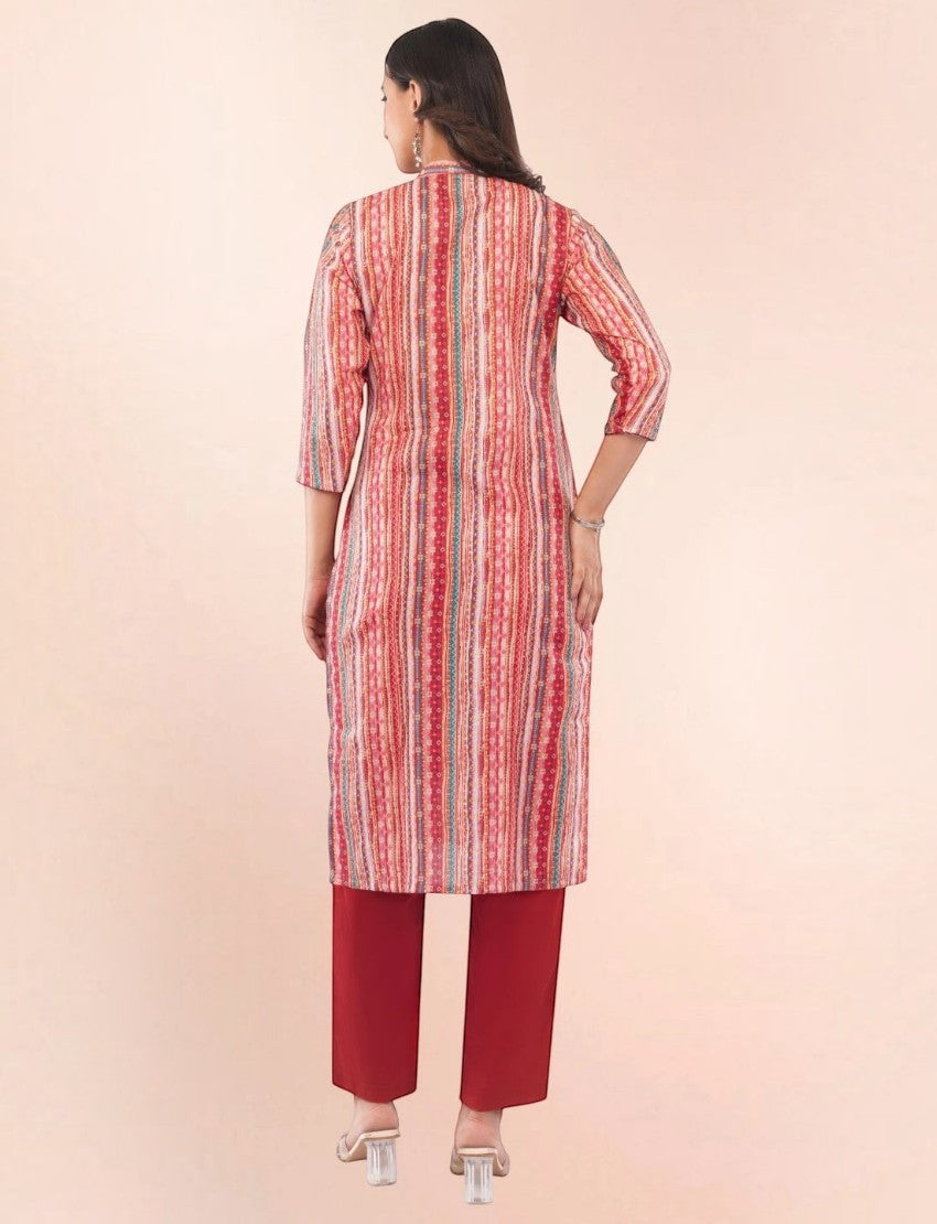 Back view of a woman wearing an Eelika red printed cotton calf-length kurta with matching trousers and dupatta