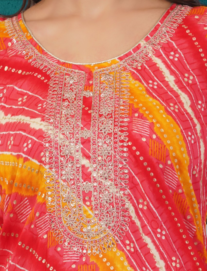 Eelika red and yellow cotton kurta with intricate silver embroidery around the round neckline and Bandhani print