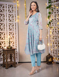 Eelika sky blue floral organza Anarkali kurta with 3/4 sleeves and cotton trousers, worn by a smiling model.