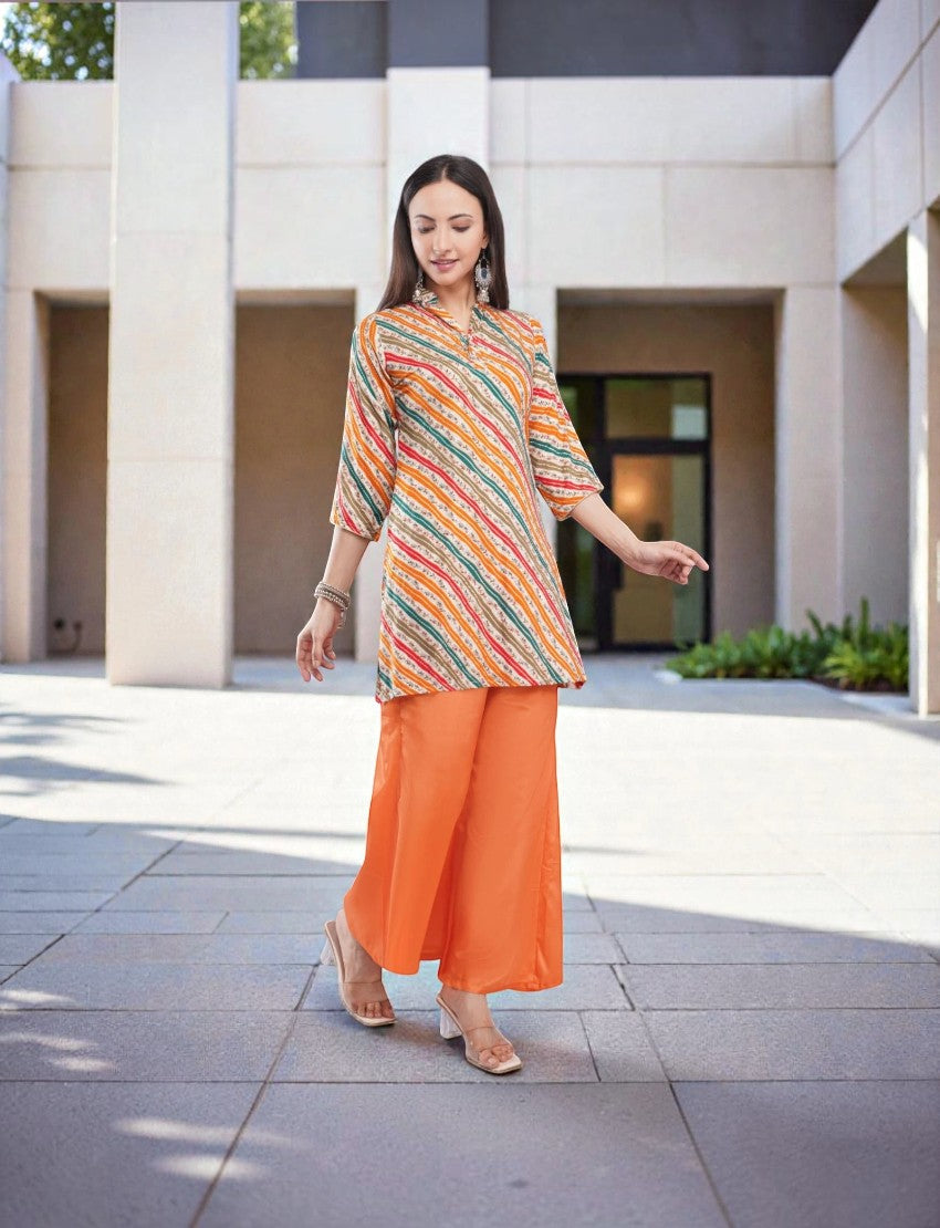 Eelika multicolour striped crepe kurta with orange georgette palazzo pants worn by a model in an outdoor setting