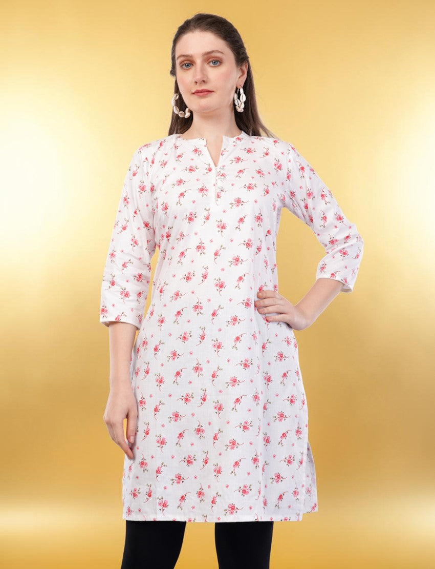 Eelika white cotton kurti featuring a pink floral print, V-neckline, and 3/4 sleeves worn by a model.