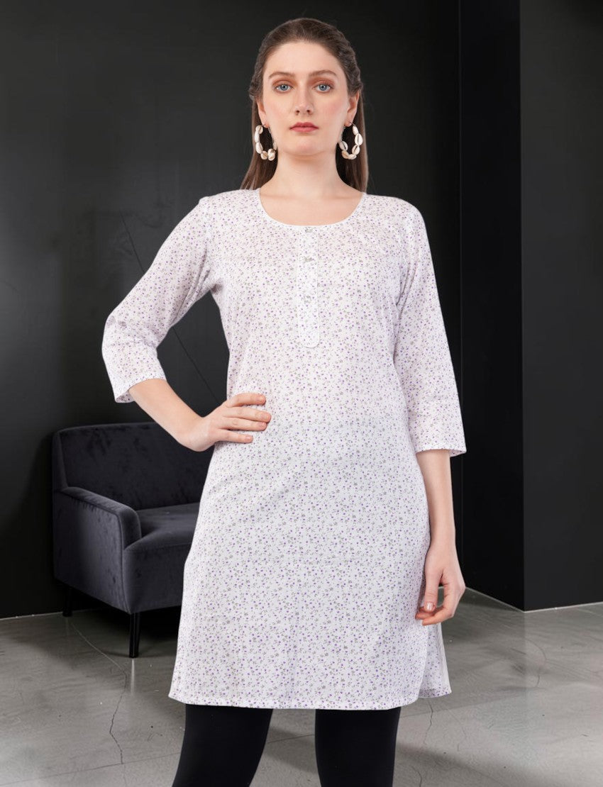 Eelika women's white cotton kurti featuring a purple floral print, round neck, and 3/4 sleeves on a model.