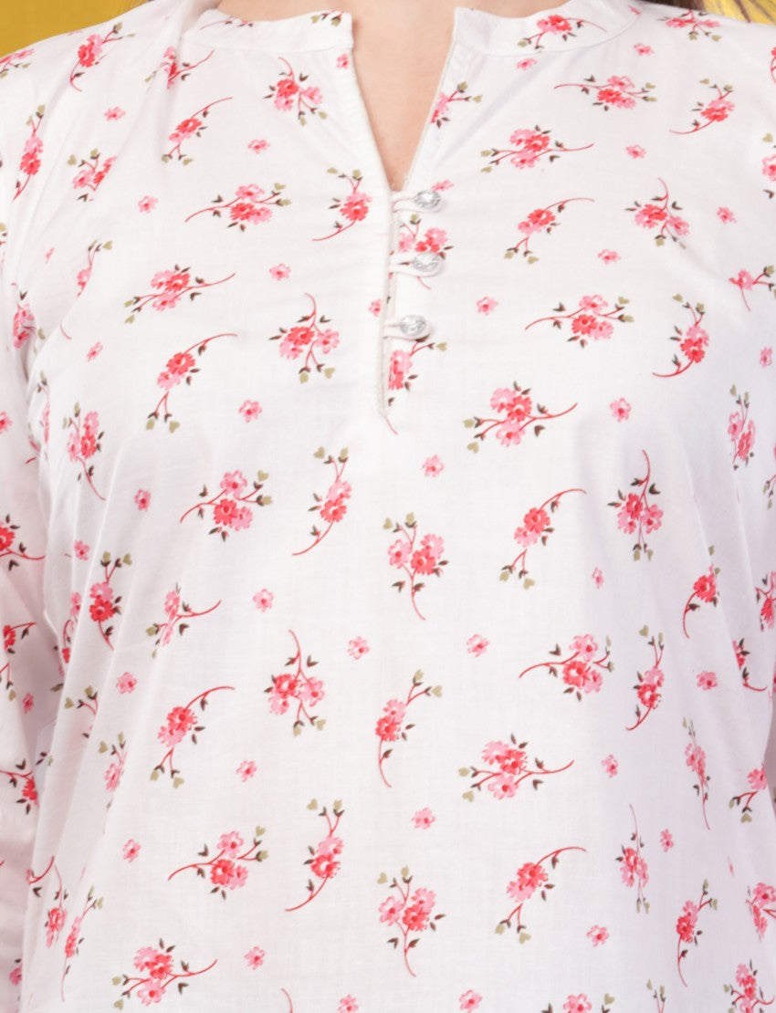Eelika women's white cotton kurti featuring a pink floral print, V-neckline, and button detailing.