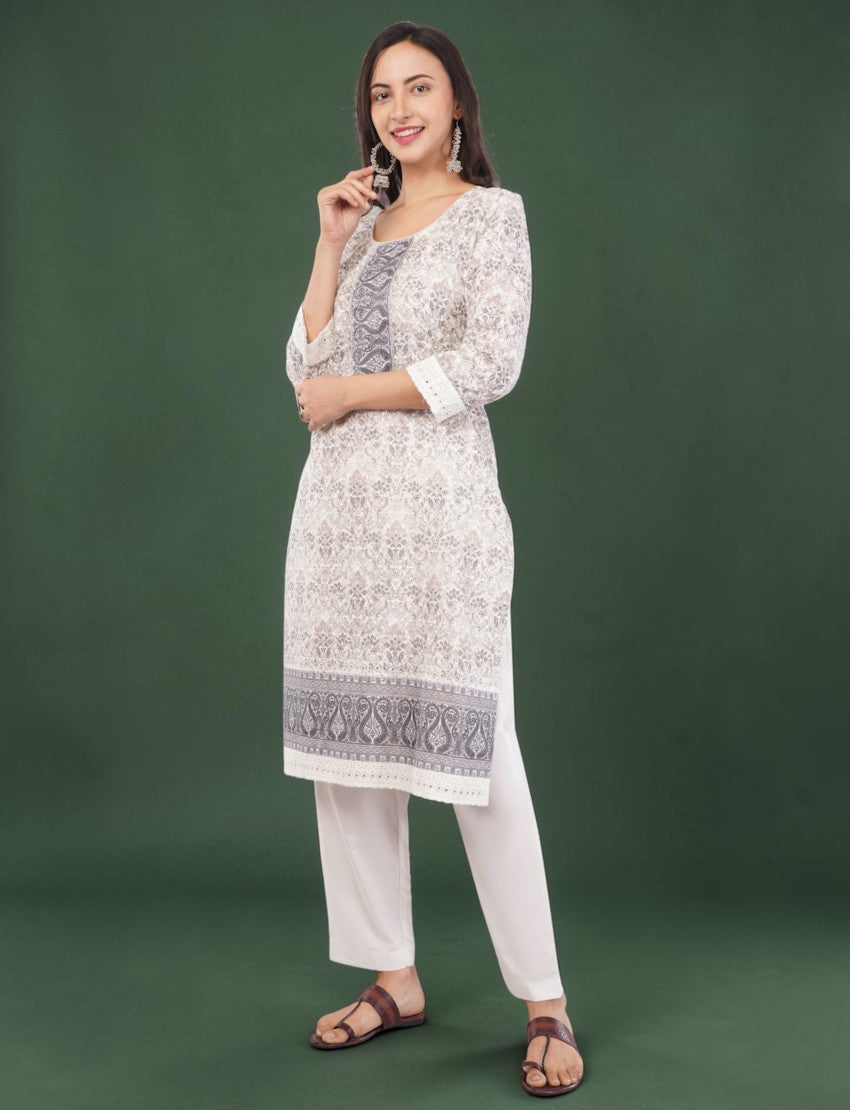 Eelika white and grey cotton printed knee-length kurta set with 3/4 sleeves, matching trousers, and dupatta
