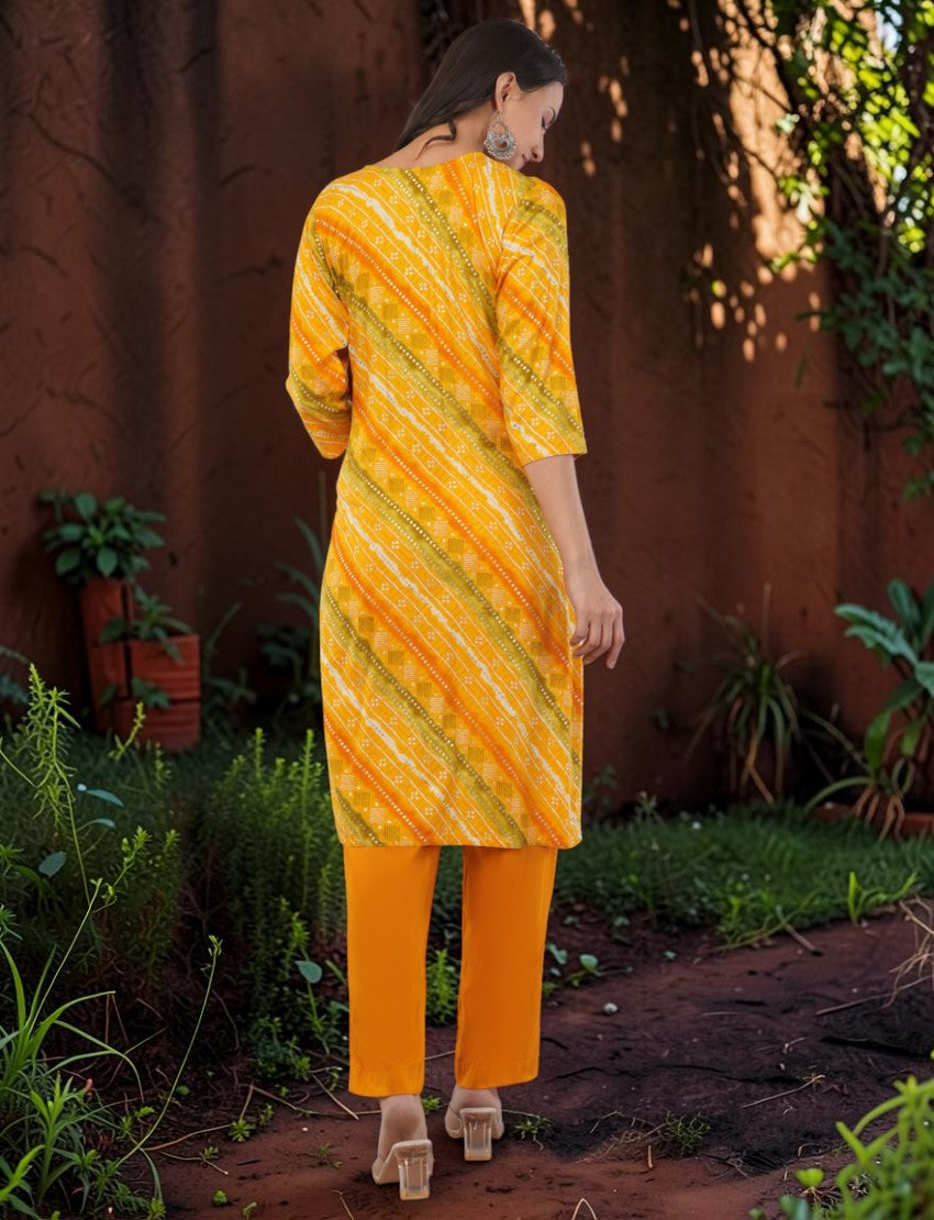 Eelika yellow and orange cotton Bandhani print knee-length kurta with matching trousers and 3/4 sleeves